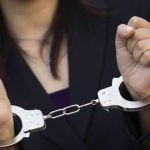 Woman in handcuffs